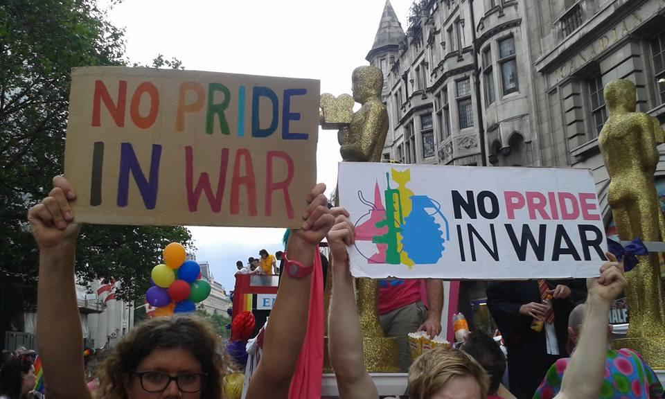 Banners declaring 'No Pride in War'