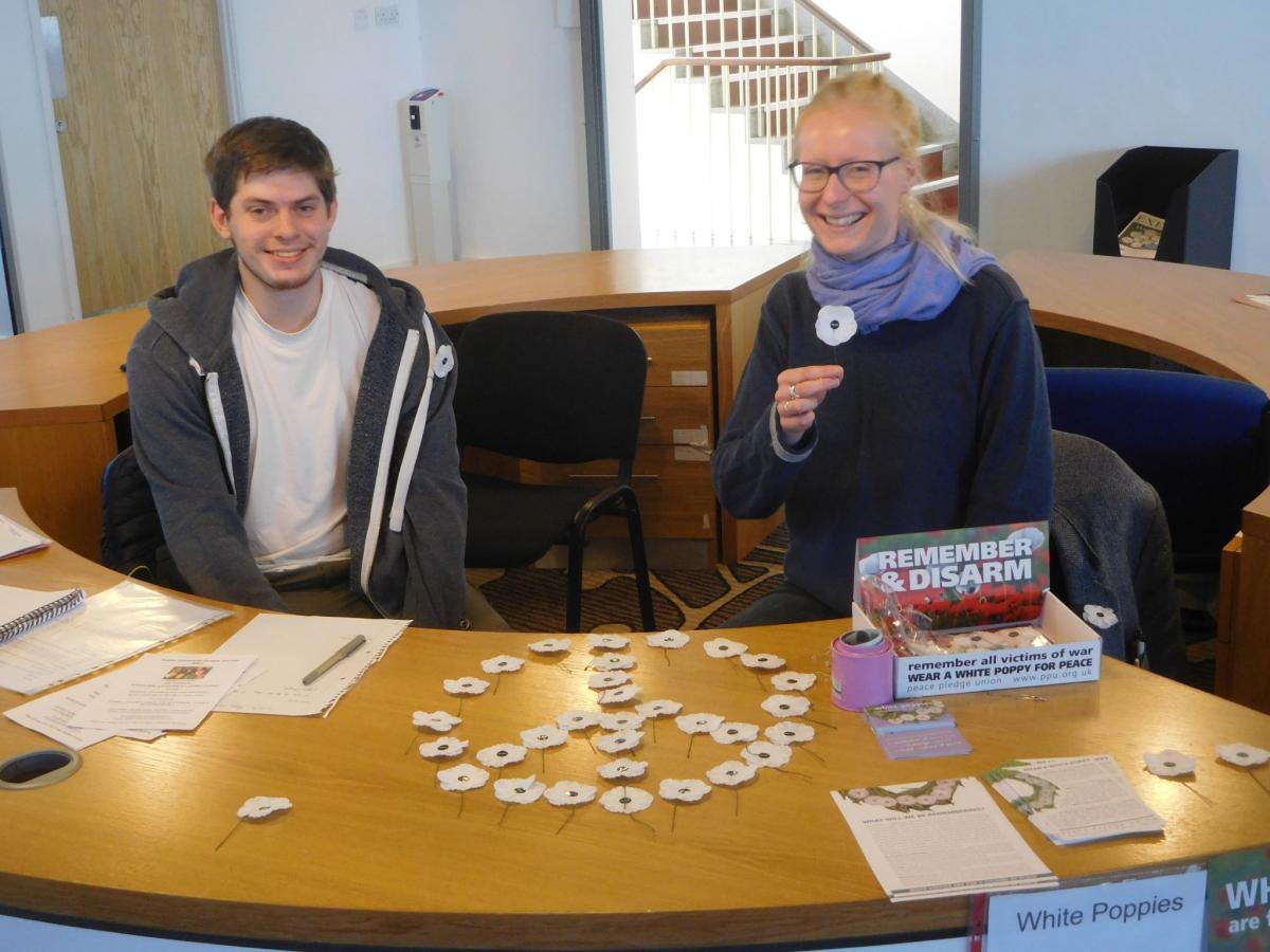 Students selling white poppies at Exeter University this year